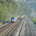 Amtrak P32AC-DM 704 @ Riverdale (Train 239). Amtrak train #242 is trailing train #284 on the southbound express track. Photo tak