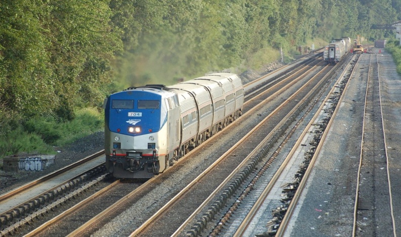 Amtrak P32AC-DM 704 @ Riverdale (Train 239). Amtrak train #242 is trailing train #284 on the southbound express track. Photo taken by Brian Weinberg, 9/4/2006. DSC_7530a.jpg