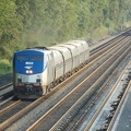 Amtrak P32AC-DM 704 @ Riverdale (Train 239). Amtrak train #242 is trailing train #284 on the southbound express track. Photo tak