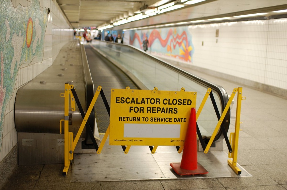 Moving sidewalk closed for repairs @ 23 St - Ely Av (E/V). Photo taken by Brian Weinberg, 11/9/2006.