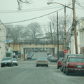 Staten Island North Shore right-of-way crossing over Faber Street at Grove Avenue. Photo looks north. Photo taken by Brian Weinb