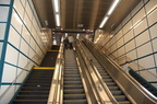 Gun Hill Rd (2/5). Stairs and escalators from street level up  to the mezzanine under the tracks. Photo taken by Brian Weinberg,