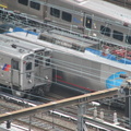 NJT Arrow III 1365 and Amtrak Acela and LIRR M-7 @ Penn Station. Photo taken by Brian Weinberg, 8/17/2007.