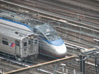 NJT Arrow III 1365 and Amtrak Acela 2032 @ Penn Station. Photo taken by Brian Weinberg, 8/17/2007.