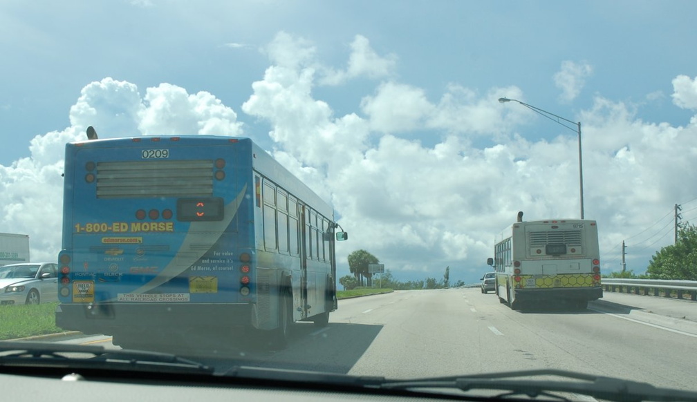 Bus 0209 and Broward County Transit Bus 9715 @ Sheridan Street Station. Photo taken by Brian Weinberg, 9/12/2007.
