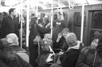 R-1 381 @ Lower East Side - 2 Av (V). Interior. Note the woman in a wheelchair on a non-ADA train. Photo taken by Brian Weinberg