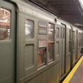 R-1 381 @ Lower East Side - 2 Av (V). Note: this is a museum train operating in revenue service during the holiday season. Photo