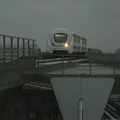 Inbound from Jamaica AirTrain arriving at Federal Circle station. Note the burnt out headlight.