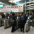 AirTrain customers @ Howard Beach swiping and/or arguing and being let in/out for free.