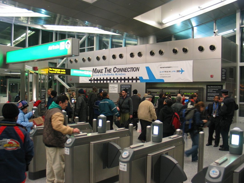 AirTrain customers @ Howard Beach swiping and/or arguing and being let in/out for free.