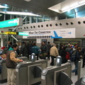 AirTrain customers @ Howard Beach swiping and/or arguing and being let in/out for free.