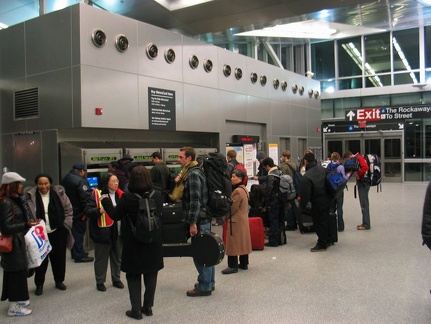 AirTrain customers who have come off the (A) @ Howard Beach are waiting to buy PPR's to pay the $5 AirTrain fare.