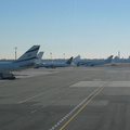 EL AL Boeing 747-400 4X-ELA and another one away from the terminal @ Terminal 4 (JFK). Photo taken by Brian Weinberg, 1/11/2004.