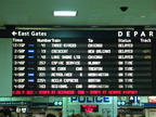 Departure board at Penn Station. Note the delayed trains. Photo taken by Brian Weinberg, 1/11/2004.