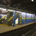 Temporary wooden shed built on to the back of a staircase on the center platform @ 59 St-Columbus Circle. Photo taken by Brian W