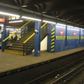 Temporary wooden shed built on to the back of a staircase on the center platform @ 59 St-Columbus Circle. Photo taken by Brian W