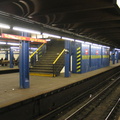 Temporary wooden shed built on to the back of a staircase on the center platform @ 59 St-Columbus Circle. Photo taken by Brian W