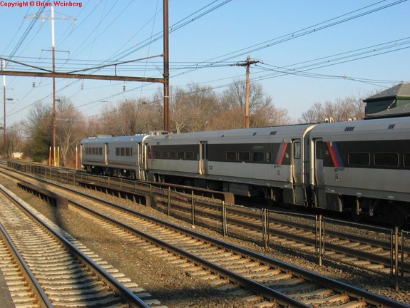 NJT Comet V Cab 6037 and Comet IV Cab 5021 @ Edison, NJ. Note the two cab cars coupled together. Photo taken by Brian Weinberg,