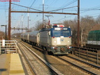 Amtrak AEM7 932 @ Edison, NJ. Note the rear coach seems to be Conference Car 9800. Photo taken by Brian Weinberg, 2/13/2004.