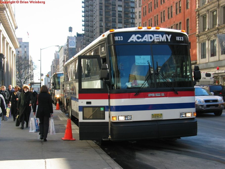 Academy MCI D4500 1833 @ 23 St/5 Av. Photo taken by Brian Weinberg, 2/16/2004.