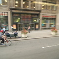 Bicyclist on 5 Av as seen from the M2 bus. Photo taken by Brian Weinberg, 6/29/2006.