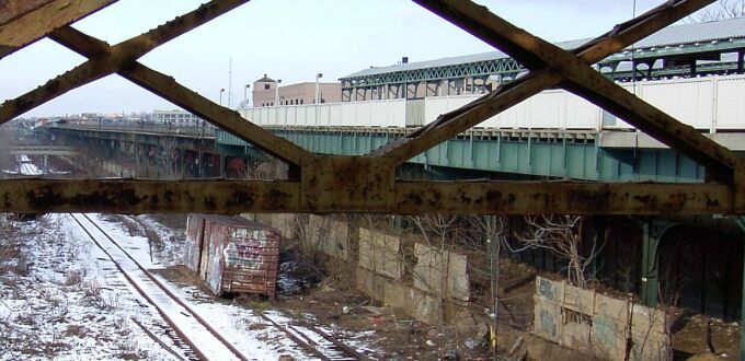 View looking north from the pedestrain bridge that leads to the Junius St stop on the (3). Photo taken by Brian Weinberg, 12/29/