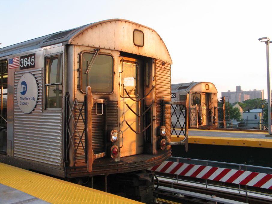 R-32 3645 (Q) and R-32 3605 (F) @ Coney Island - Stillwell Av. Photo taken by Brian Weinberg, 6/23/2004.