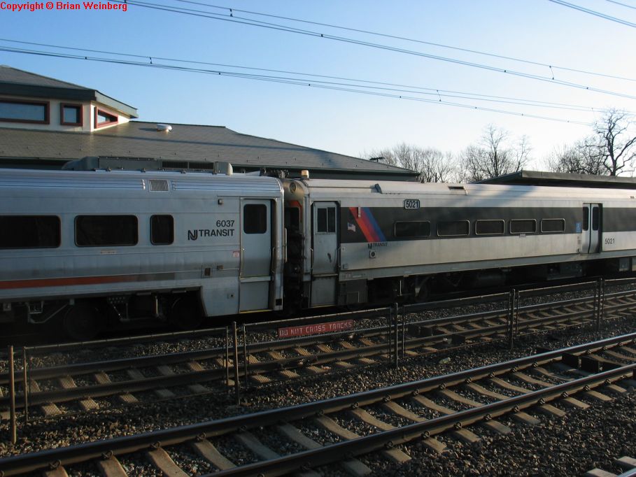 NJT Comet V Cab 6037 and Comet IV Cab 5021 @ Edison, NJ. Note the two cab cars coupled together. Photo taken by Brian Weinberg,